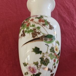 Elegant White Porcelain Vase with Floral and Bird Design